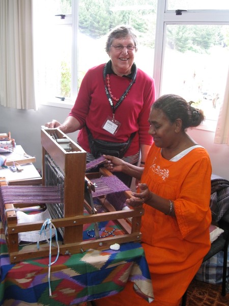 Local Taupo art woman teaching one of the Kanak ladies weaving